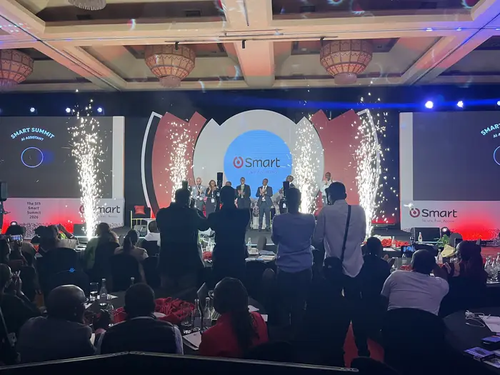 Stage with sparkler effects and LED screens at the SMART Summit